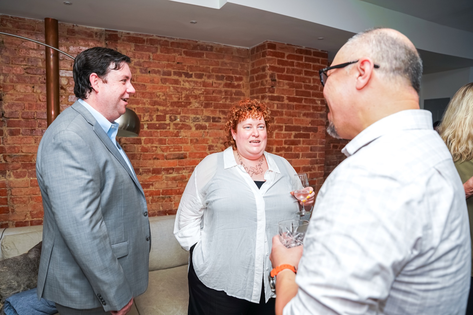 Guests in conversation at the DCZ Legal launch party.